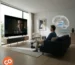 Viewer showing emotional reaction while watching a film with subtitles